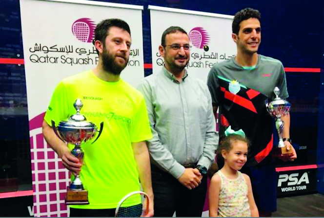 England’s Daryl Selby (left), winner of the QSF No.1, PSA Bronze tournament, poses with the trophy along with runner-up Omar Mosaad of Egypt at the Khalifa International Tennis and Squash Complex in Doha yesterday. 