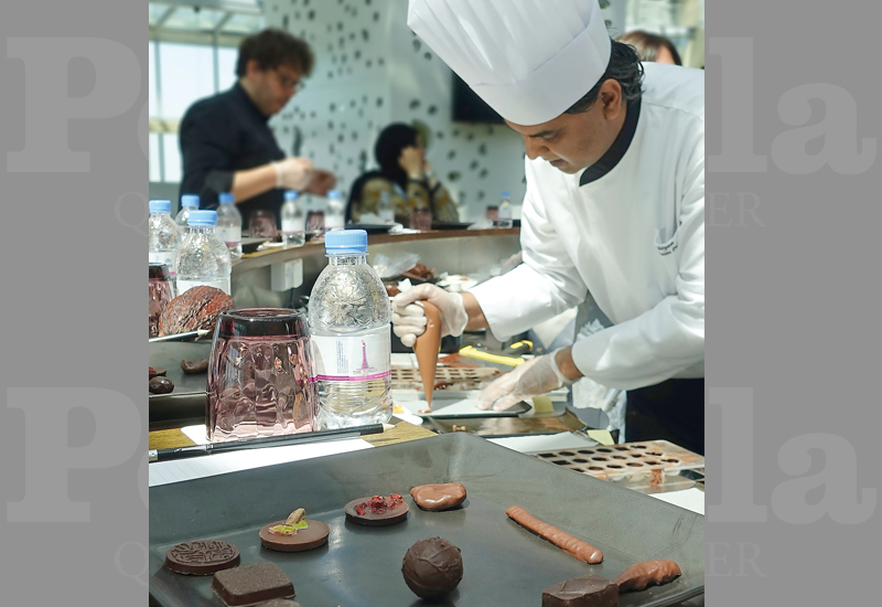 Chef Sham preparing chocolate. 
