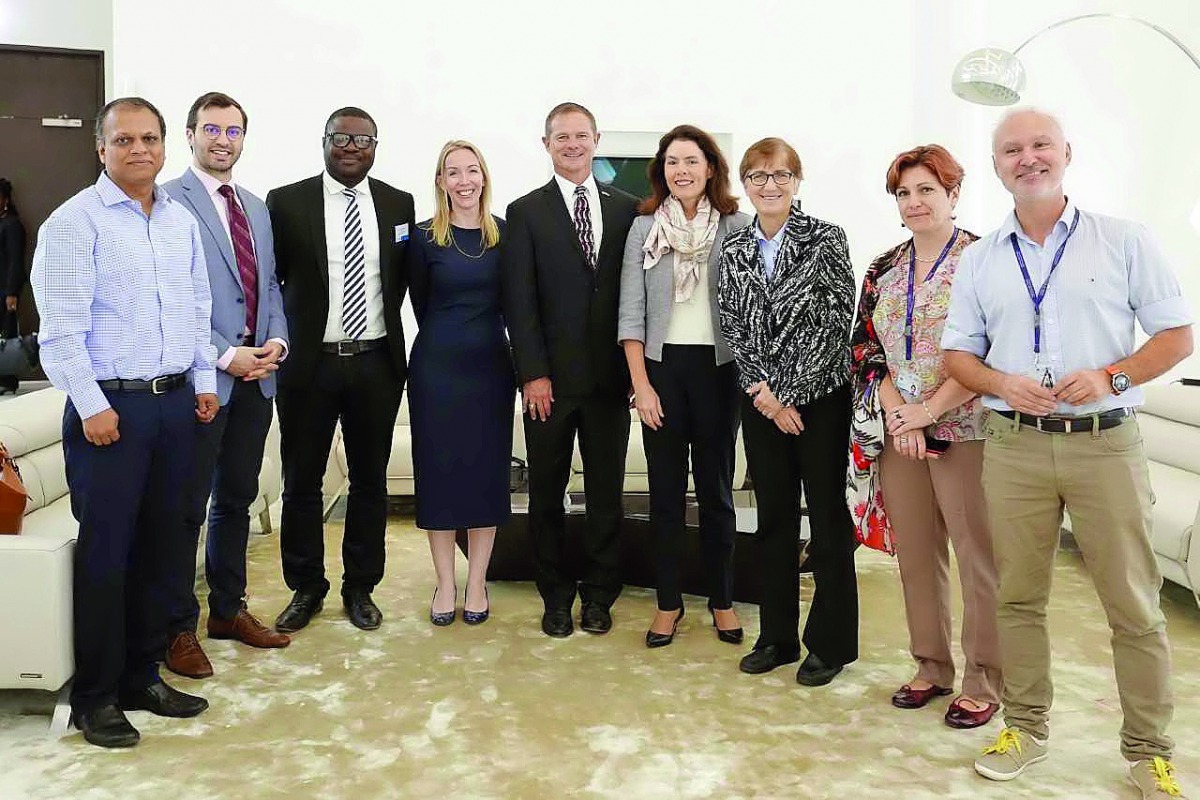 Dr  Helen Currie (fourth right), Chief Economist at ConocoPhillips, with HBKU faculty members and other officials.