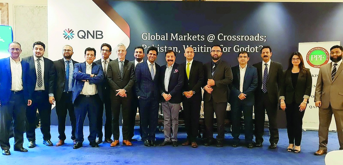Richard Morin, CEO, Pakistan Stock Exchange; Ajay Kumar, AGM, QNB Asset Management; and Mohsin Mujtaba, Chairman, PPFQ with other distinguished guests on the sidelines of the roundtable.