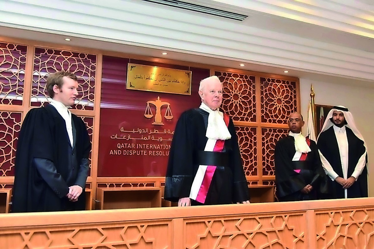 Lord Thomas of Cwmgiedd (second left) swearing in as the new President of QICDRC