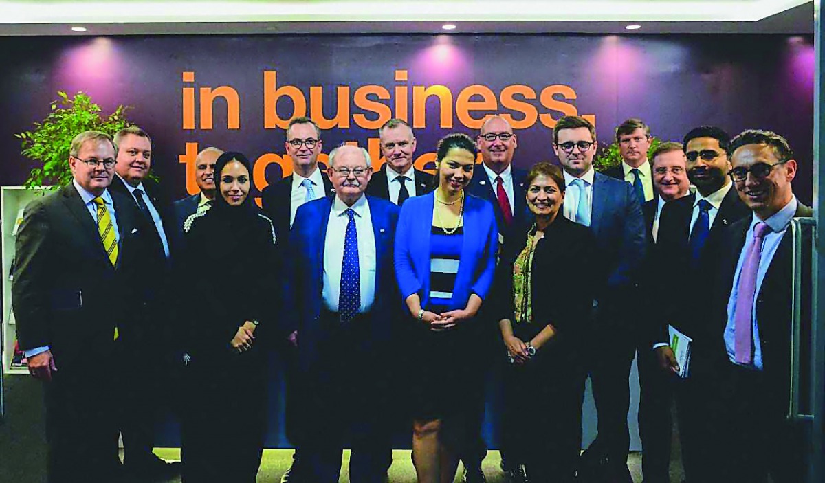 The officials pose for a group picture.