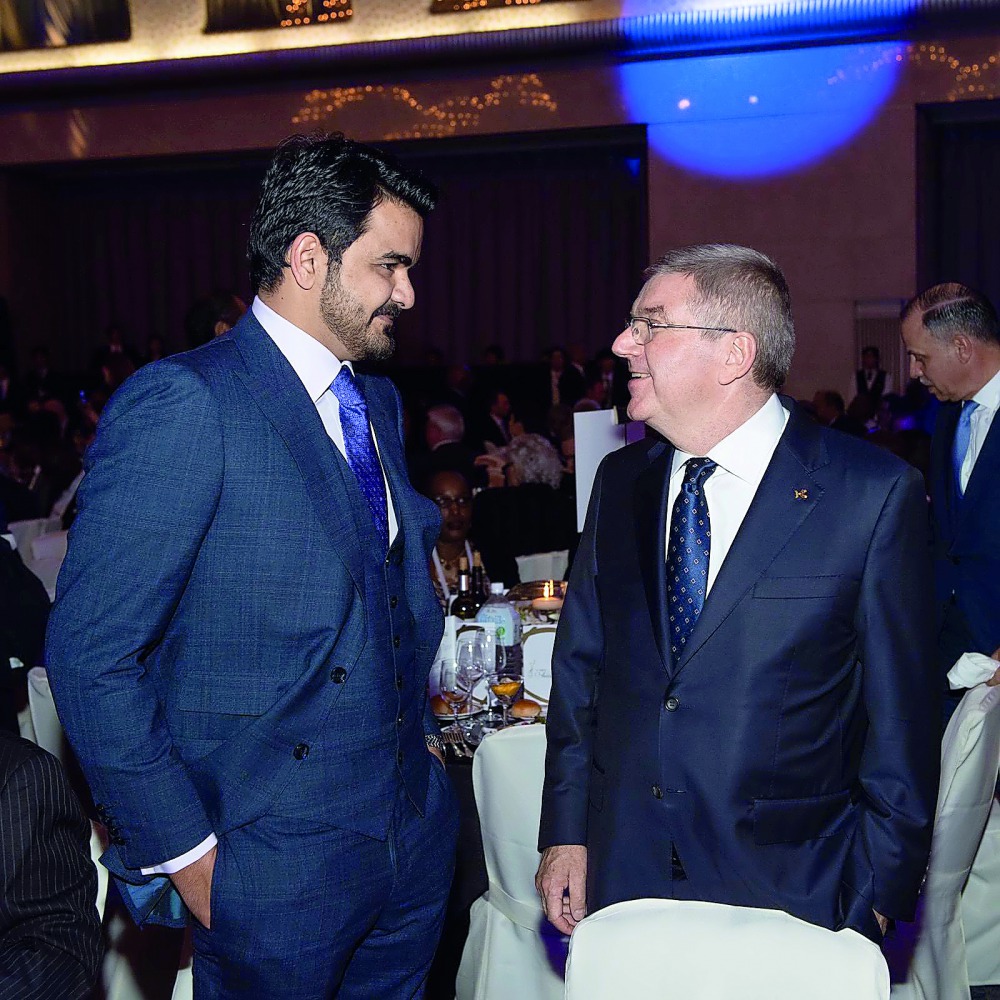 H E Sheikh Joaan bin Hamad Al Thani, President of the Qatar Olympic Committee (QOC), speaks with International Olympic Committee President, Thomas Bach during the General Assembly of The Association Of National Olympic Committees (ANOC), in Tokyo, Japan y