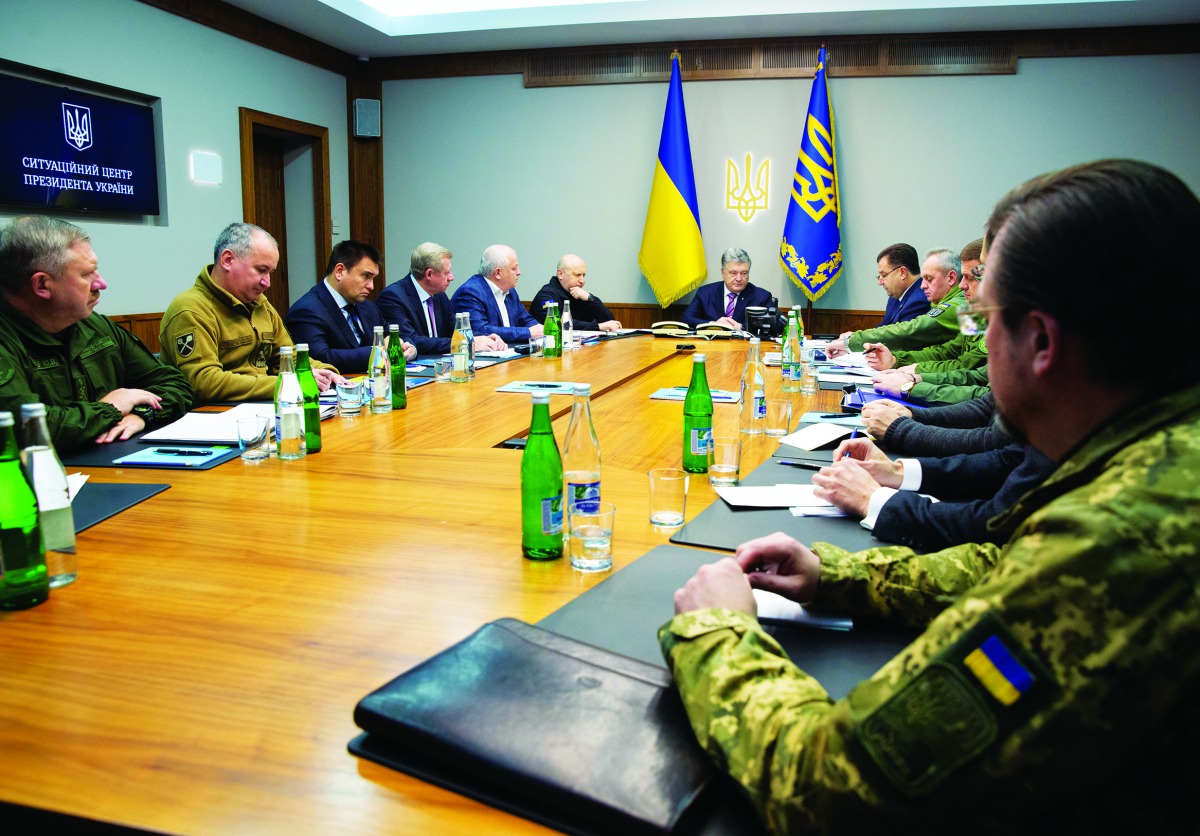 Ukrainian President Petro Poroshenko chairs a meeting with heads of military and security forces in Kiev, Ukraine November 30, 2018. Mykhailo Markiv/Ukrainian Presidential Press Service/via Reuters 

