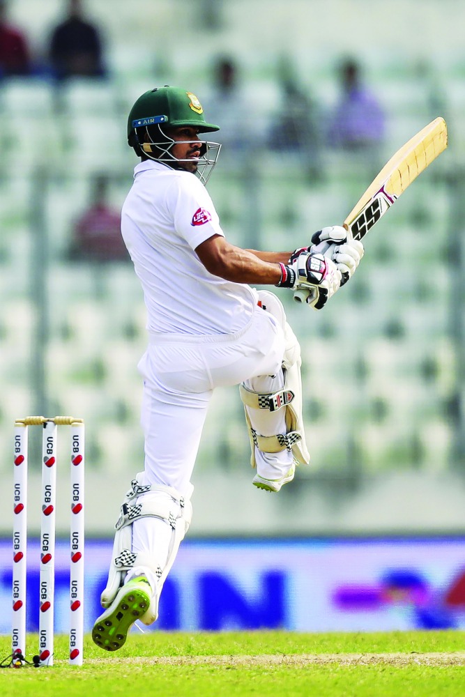 Bangladesh's Shadman Islam plays a shot during the first day of the second Test cricket match between Bangladesh and West Indies in Dhaka on November 30, 2018. AFP/Salahuddin Ahmed
