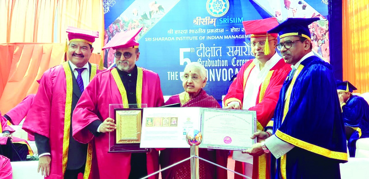 Dr. R Seetharaman, CEO of Doha Bank, with “Honor of the Doctoral Fellowship”.