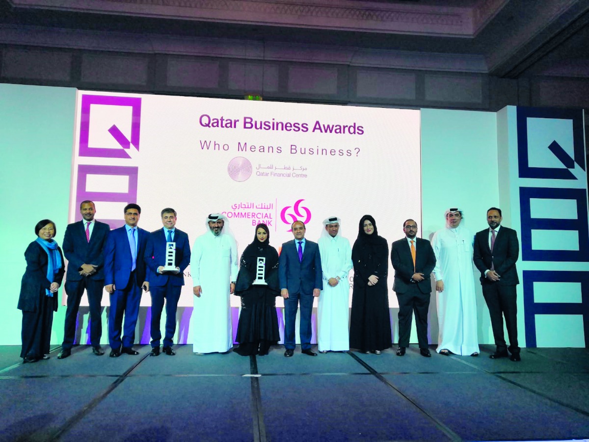 The Commercial Bank team, led by Joseph Abraham, Group Chief Executive Officer, after receiving the award.