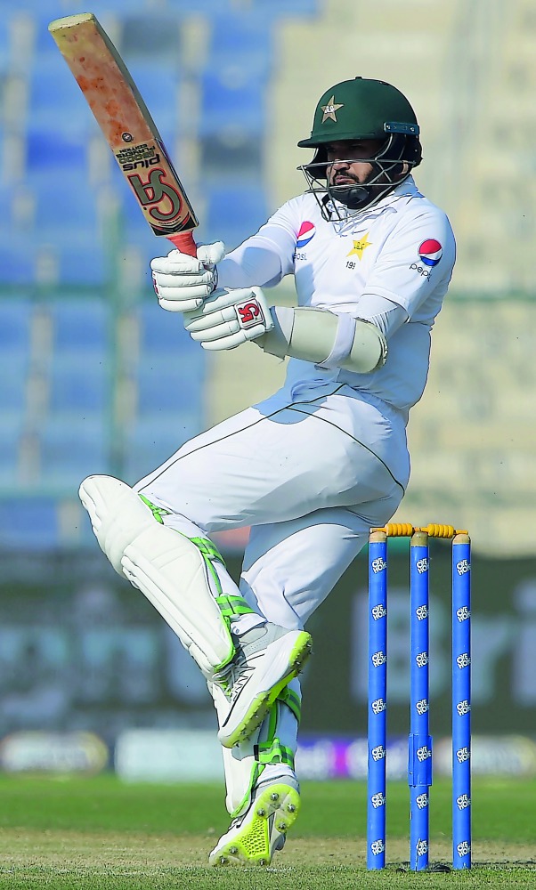 Pakistani batsman Azhar Ali plays a shot during the second day of the third and final Test cricket match between Pakistan and New Zealand at the Sheikh Zayed International Cricket Stadium in Abu Dhabi on December 4, 2018. AFP / Aamir Qureshi
