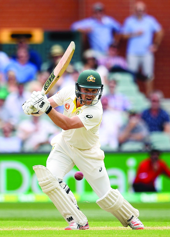 Australia's batsman Travis Head plays a shot on day two of the first test match between Australia and India at the Adelaide Oval in Adelaide, Australia, December 7, 2018. AAP/Dave Hunt/via Reuters.  
