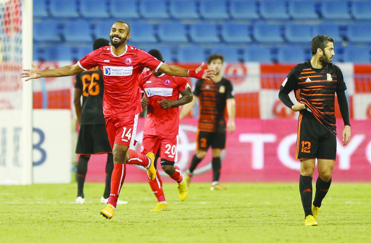 Al Arabi’s Qatari striker Fahad Al Balooshi (left) celebrates after scoring his second goal against Umm Salal during the QNB Stars League match played at the Al Gharafa Stadium yesterday.