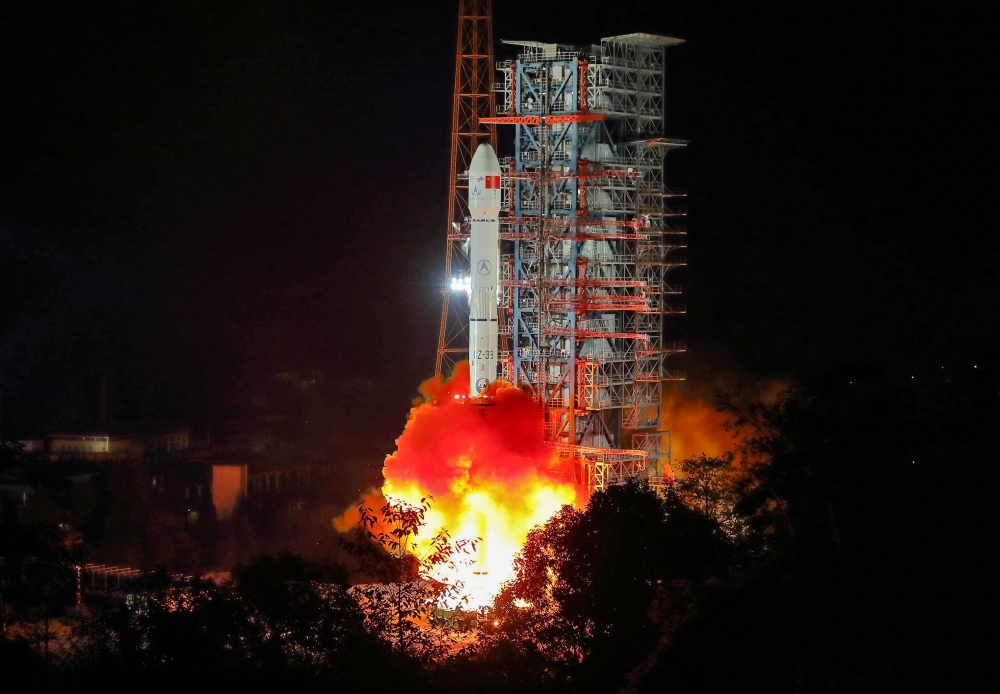 A Long March 3B rocket lifts off from the Xichang launch centre in Xichang in China's southwestern Sichuan province early on December 8, 2018. China OUT / AFP / STR