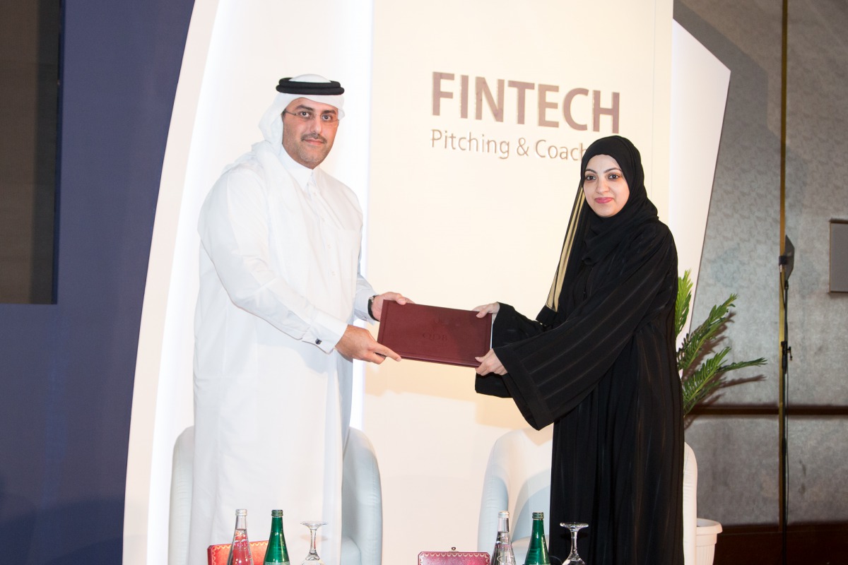 Officials exchanging the document.