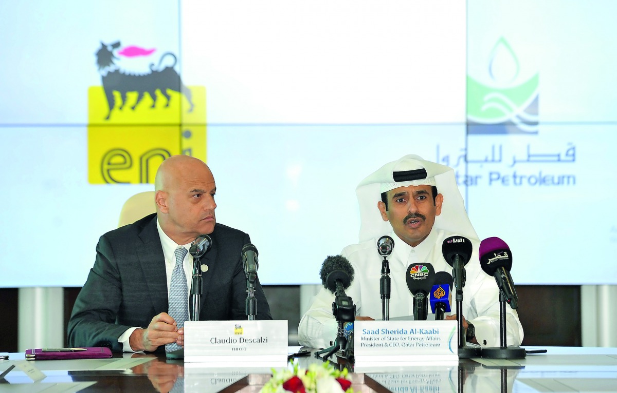 H E Saad bin Sherida Al Kaabi, Minister of State for Energy Affairs, and President & CEO of Qatar Petroleum (QP); and Claudio Descalzi, CEO of ENI, addressing the media after signing the agreement at QP headquarters, in Doha yesterday. Pic: SALIM MATRAMKO