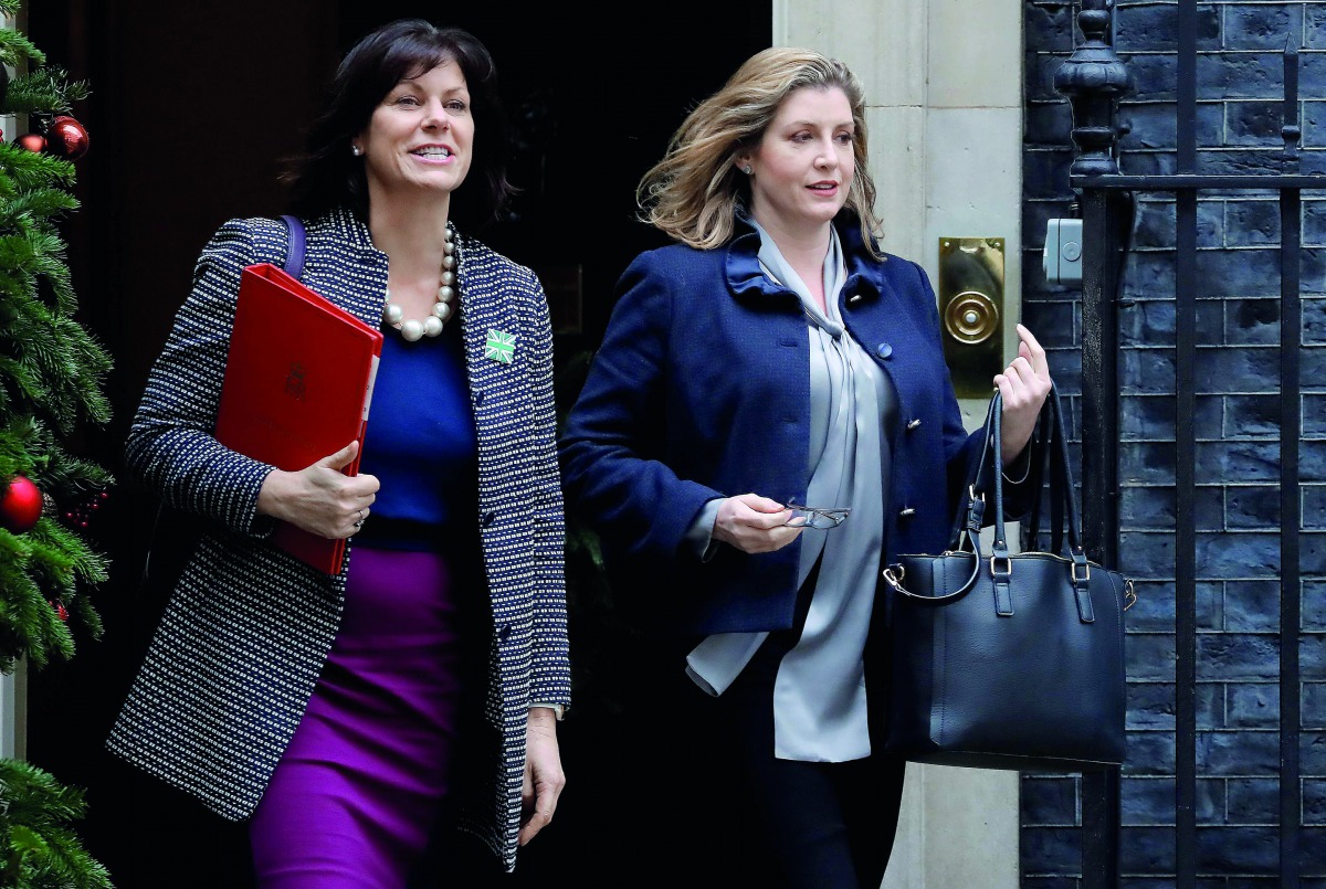 Britain's Minister of State at the Department for Business, Energy and Industrial Strategy Claire Perry (L) and Britain's International Development Secretary and Minister for Women and Equalities Penny Mordaunt leaves from 10 Downing Street in central Lon