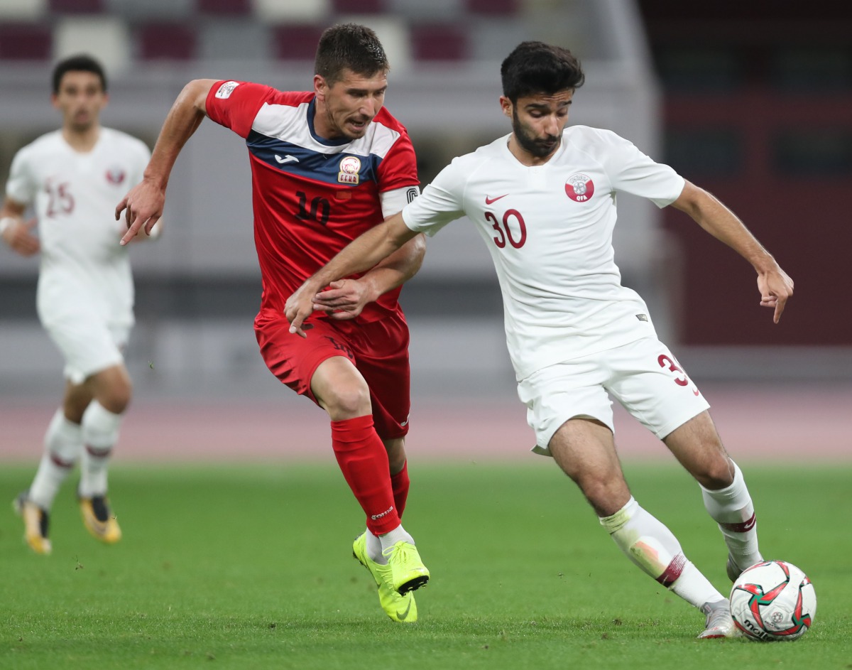 Action during yesterday’s friendly encounter between Qatar and Kyrgyztan which took place at the Khalifa International Stadium in Doha. 