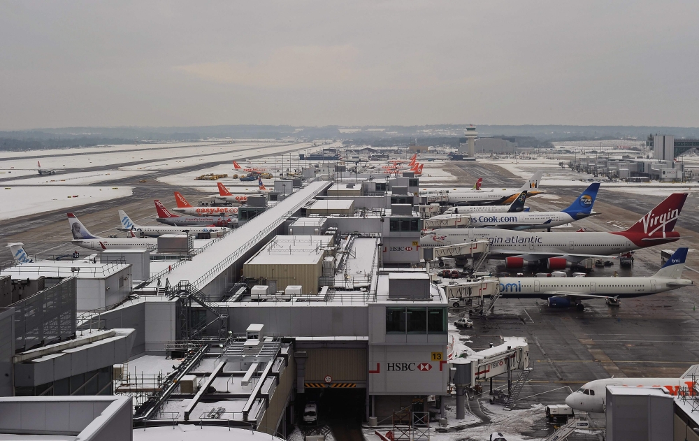 FILE PHOTO: Gatwick airport surrounded by snow in West Sussex. December 19, 2010. Carl DE SOUZA | AFP
