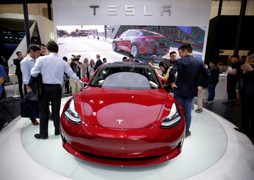 A Tesla Model 3 car is displayed during a media preview at the Auto China 2018 motor show in Beijing, China April 25, 2018. (REUTERS/Jason Lee/File Photo)