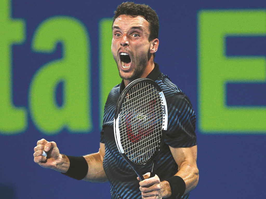 Roberto Bautista Agut celebrates his win against World No. 1 Novak Djokovic during their Qatar ExxonMobil Open semi-final match yesterday. Pic: Salim Matramkot/The Peninsula 