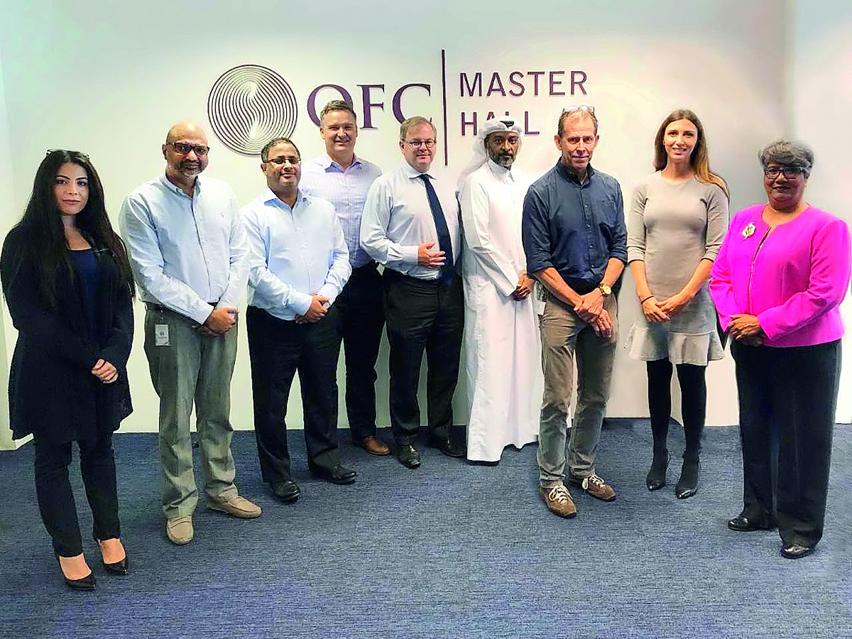 QFBA and QFC Authority officials pose for a picture.