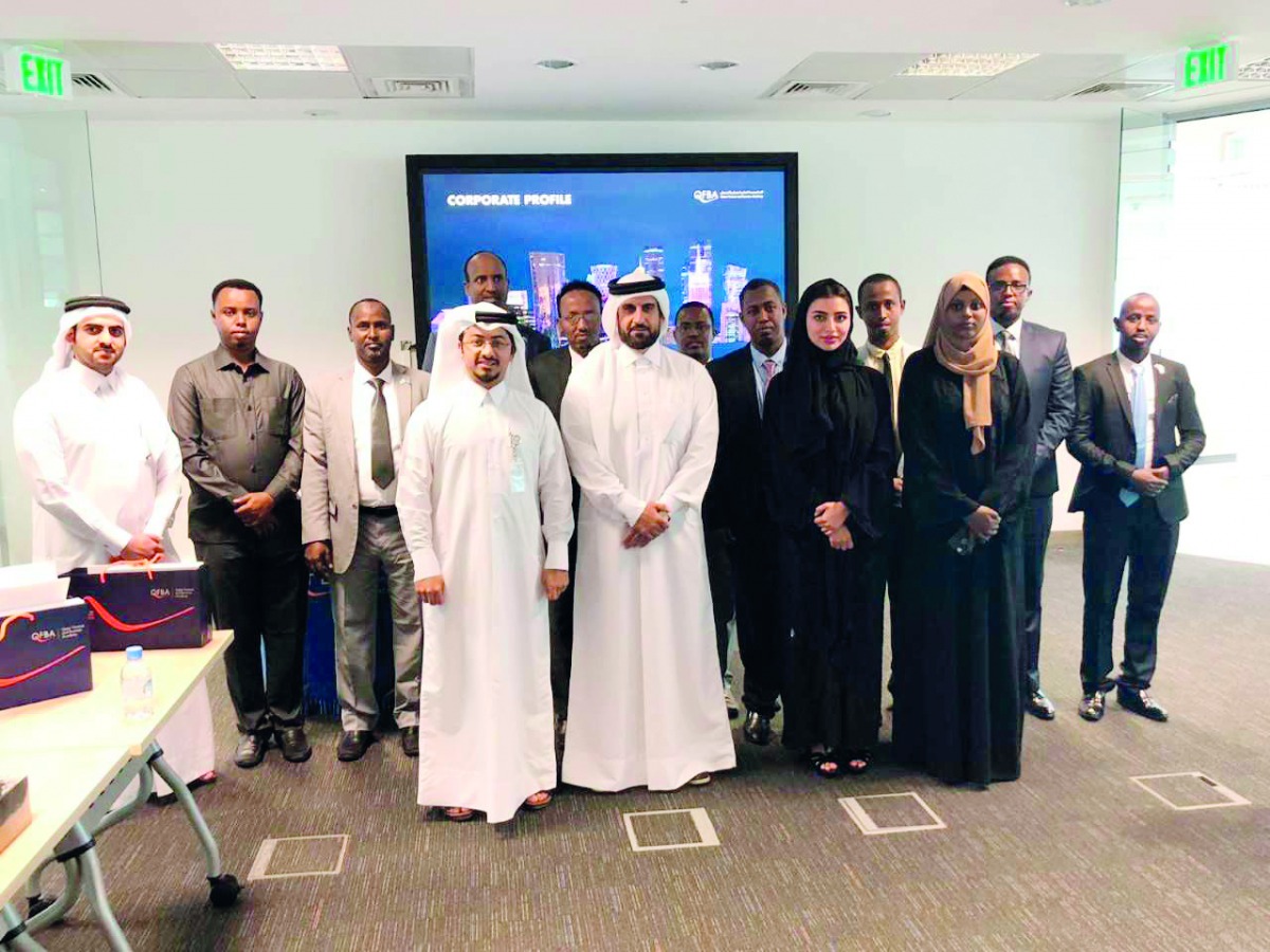 Officials of QFBA seen with the visiting diplomatic delegation from Somalia.