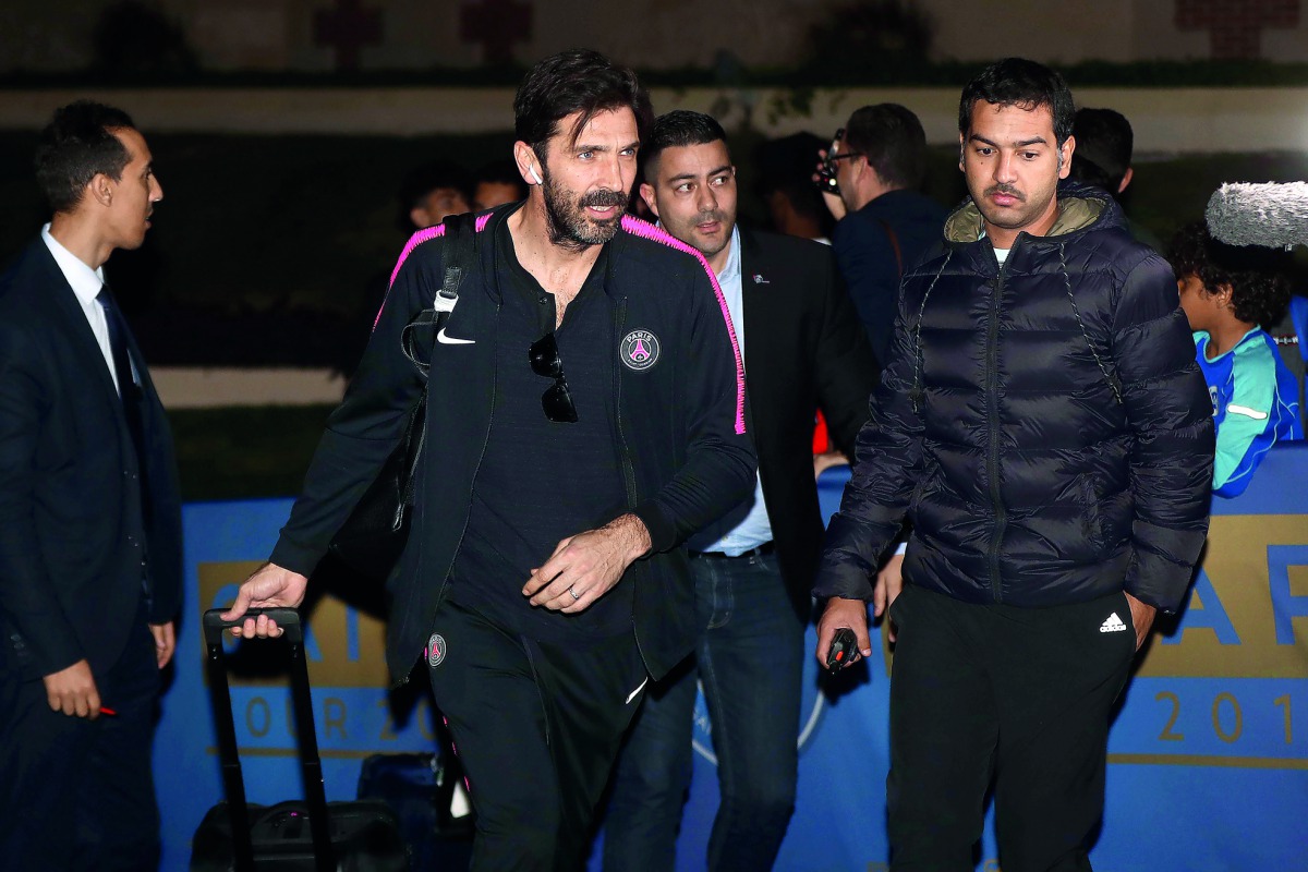 PSG goalkeeper Gianluigi Buffon checking into the team hotel upon arrival in Doha yesterday.