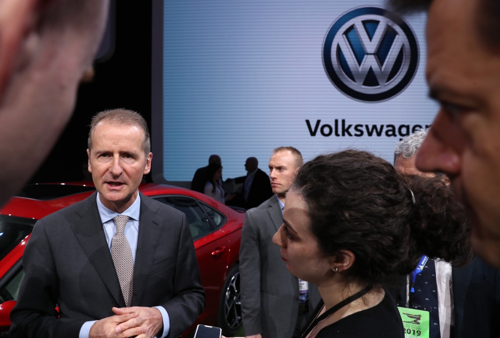 Dr. Herbert Diess, CEO, Volkswagen AG, speaks to members of the media during the reveal of new 2020 Passat at the North American International Auto Show in Detroit, Michigan, U.S., January 14, 2019. Reuters/Jonathan Ernst 