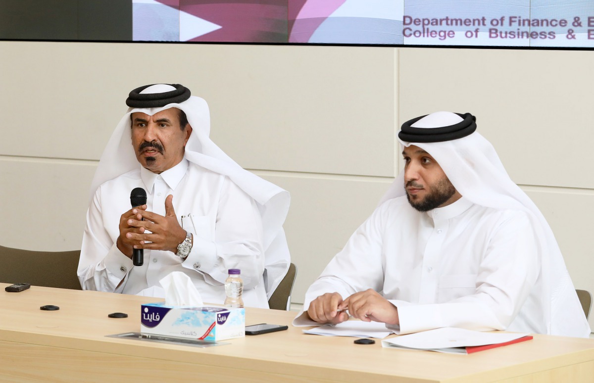 Mohamed bin Ahmed bin Towar (left), First Vice-Chairman of Qatar Chamber, speaking at the seminar, yesterday. 
