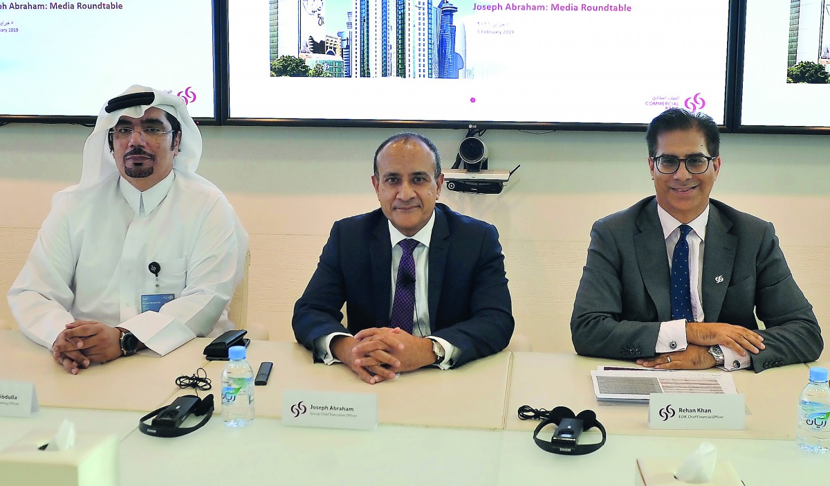 Commercial Bank Group CEO Joseph Abraham (centre);  EGM, Chief Financial Officer Rehan Ahmed Khan (right),  and Chief Marketing Officer Hussain Al Abdulla, during a media roundtable at Commercial Bank Plaza yesterday. Pic: Baher Amin / The Peninsula