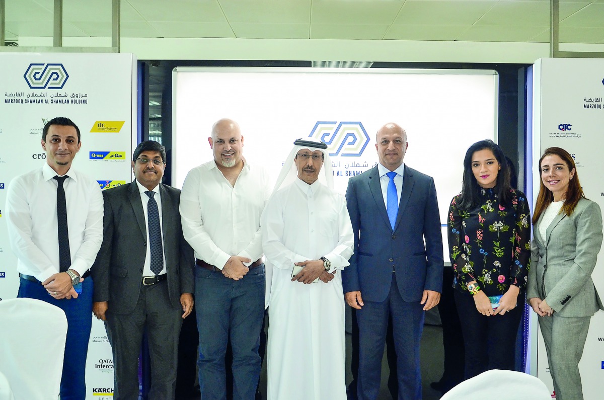 A group photo of officials and guests at Marzooq Shamlan Al Shamlan Holding’s annual media gathering.