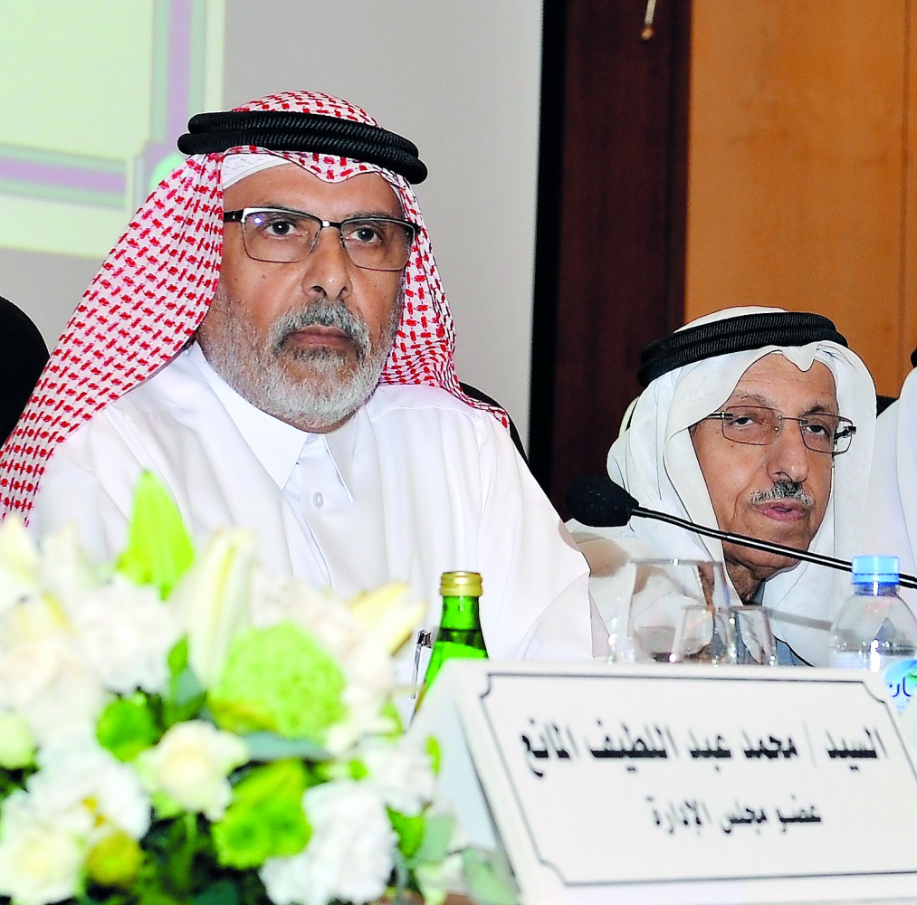 The Chairman and Managing Director of Qatar National Cement Company, Salem bin Bhutti Al Naimi (left), addressing the company’s AGM at Radisson Blu Hotel in Doha, yesterday.  Pic: Salim Matramkot/The Peninsula
