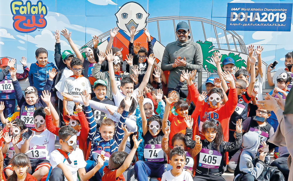 The President of the Qatar Olympic Committee, H E Sheikh Joaan bin Hamad Al Thani poses for a photograph with the official mascot for the IAAF World Athletics Championships - Doha 2019, during a ceremony at Qatar Foundation’s Awsaj Academy on the occasion