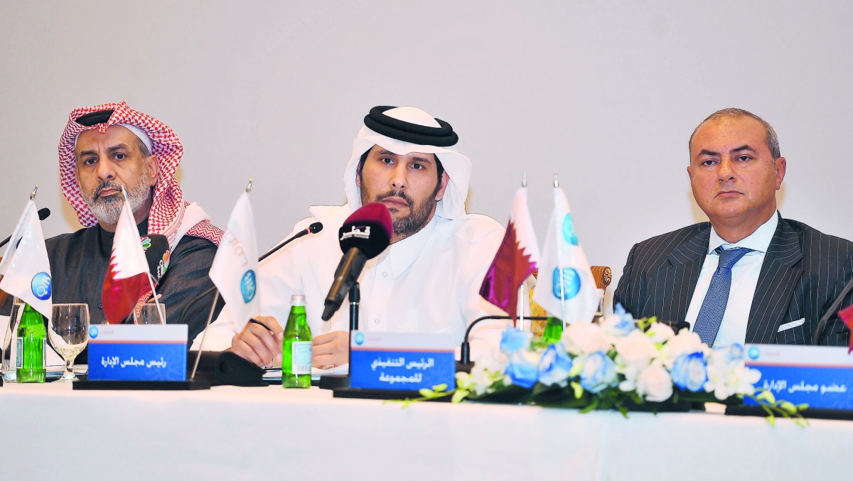 Sheikh Jassim bin Hamad bin Jassim bin Jaber Al Thani (centre), Chairman, Board of Directors, QIB; Abdullatif bin Abdulla Al Mahmoud (left), Vice-Chairman, Board of Directors; and Bassel Gamal, Group Chief Executive Officer, during the QIB General Assembl