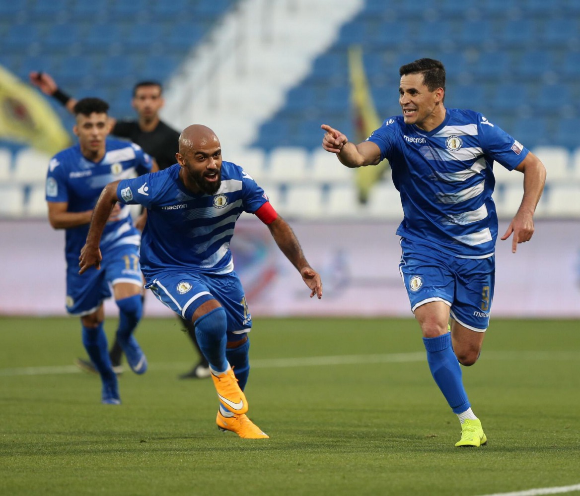 Substitute Musaab Abdulmajid (right) celebrates with team-mates after scoring Al Khor’s third goal against Qatar SC at the Al Khor Stadium yesterday.
