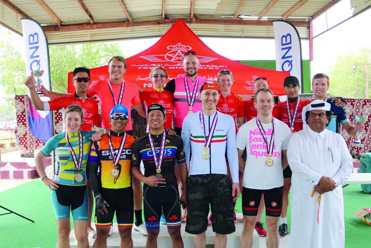 The podium winners of the respective categories pose for a photograph at the end of the fourth race of the six-round Royal Air Maroc League, on Friday.