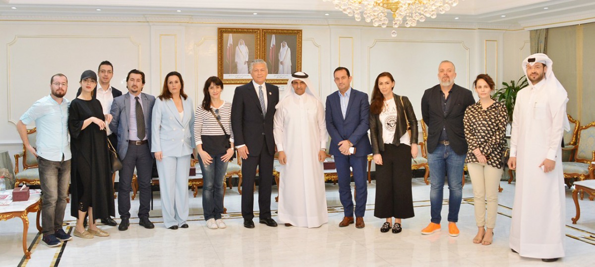 A visiting delegation of Balkan states posing for a photo with Dr Khaled Klefeekh Al Hajri.