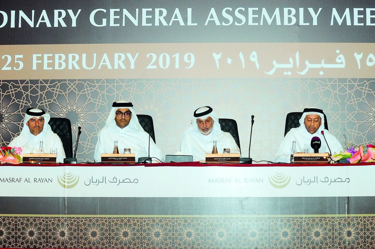 Dr Hussain Al Abdulla (right), the Chairman and Managing Director of Masraf Al Rayan, Turki bin Mohammed Al Khater (second right), Vice-Chairman, and other board members at the AGM, held at Sheraton Grand Doha Resort & Convention Hotel, yesterday.
