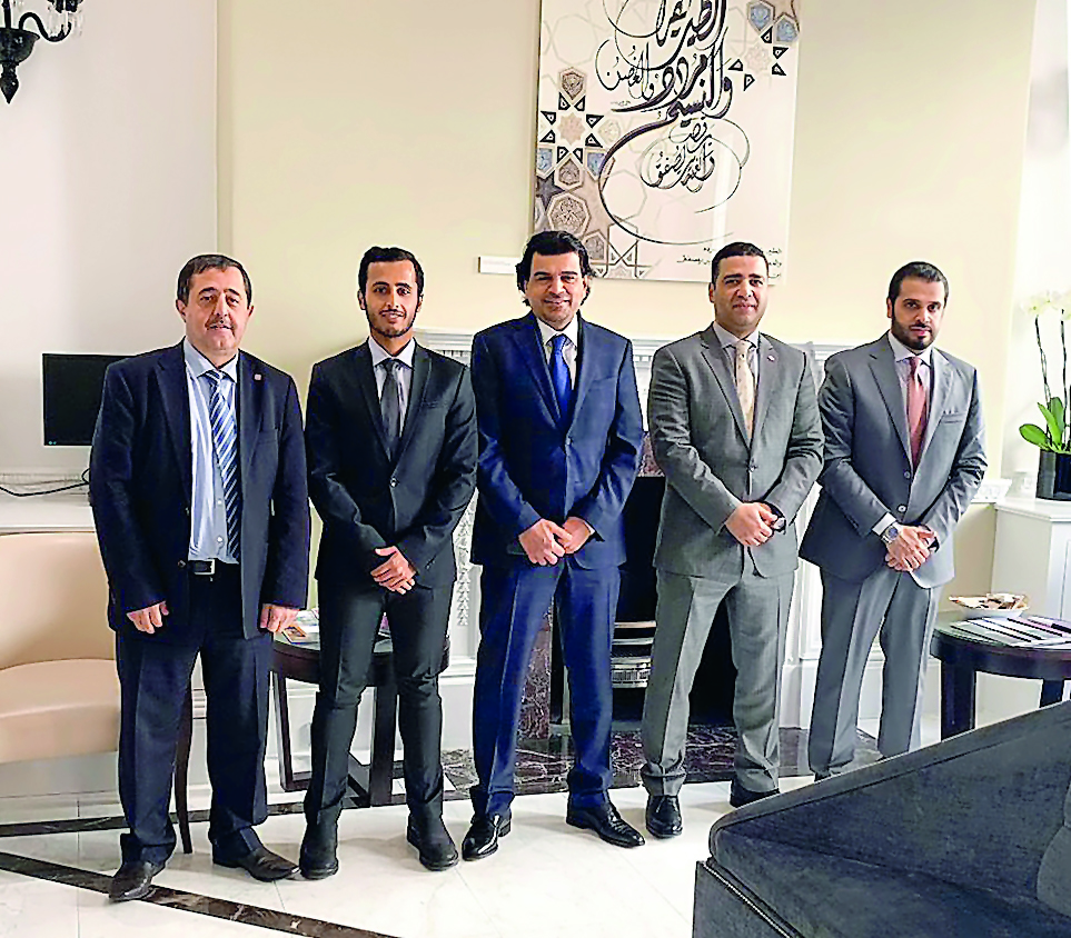 Dr. Abdulbasit Ahmad Al Shaibei (centre), QIIB Chief Executive Officer, with other officials on the sidelines of the Sukuk issuance announcement.