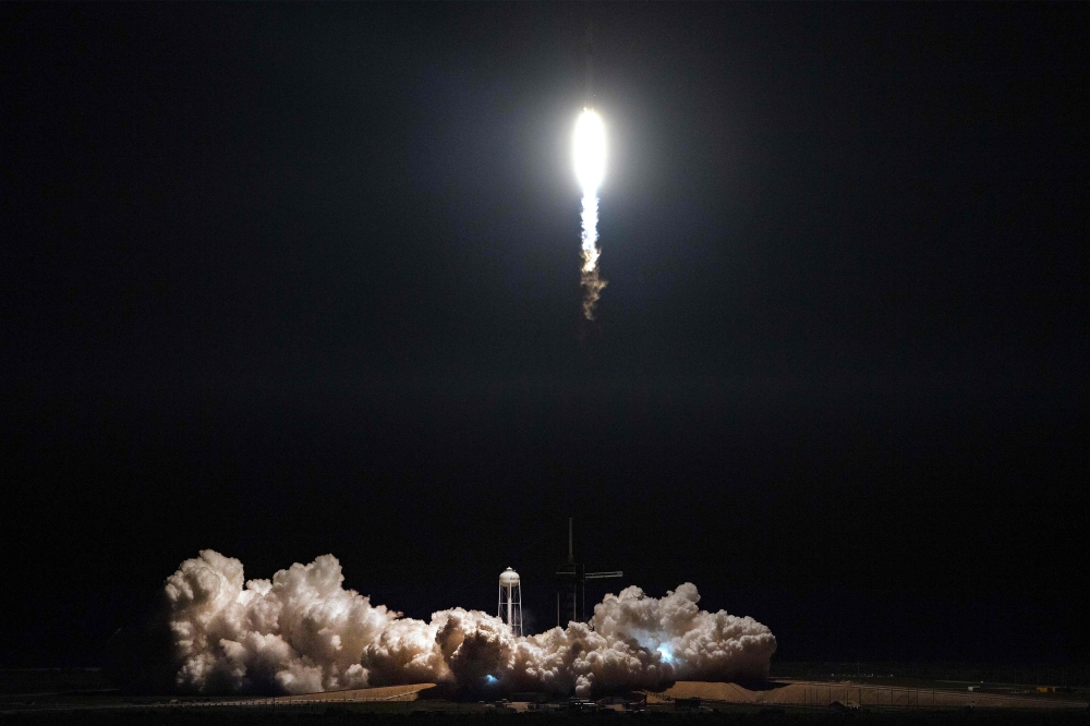 SpaceX Falcon 9 rocket with the company's Crew Dragon spacecraft onboard takes off during the Demo-1 mission, at the Kennedy Space Center in Florida on March 2, 2019.  AFP / Jim WATSON
