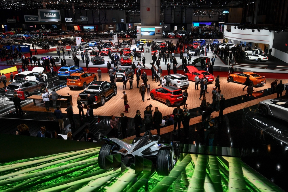 (FILES) This file photo taken on March 7, 2018 shows a general view of the Geneva International Motor Show in Geneva. The 2019 edition of the Geneva International Motor Show will be held from March 7 to March 17, 2019. / AFP / Fabrice COFFRINI