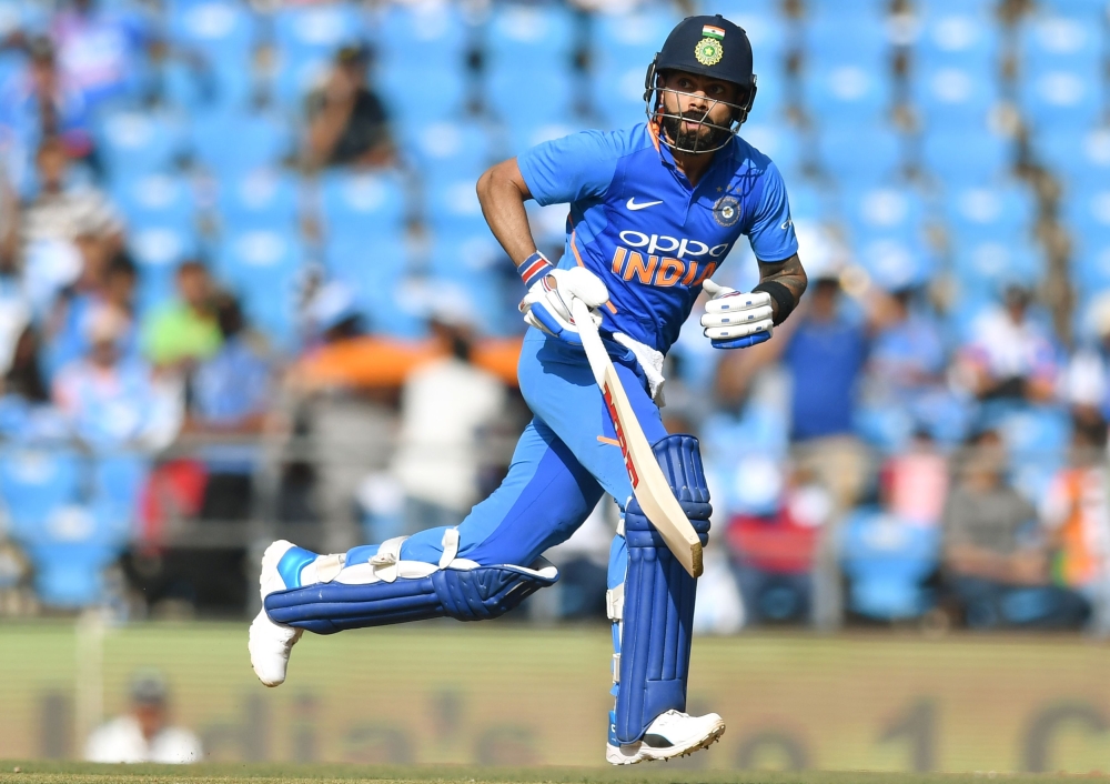 Indian captain Virat Kohli run between the wickets during the second one-day international (ODI) cricket match between India and Australia at the Vidarbha Cricket Association Stadium in Nagpur on March 5, 2019. AFP / PUNIT PARANJPE
