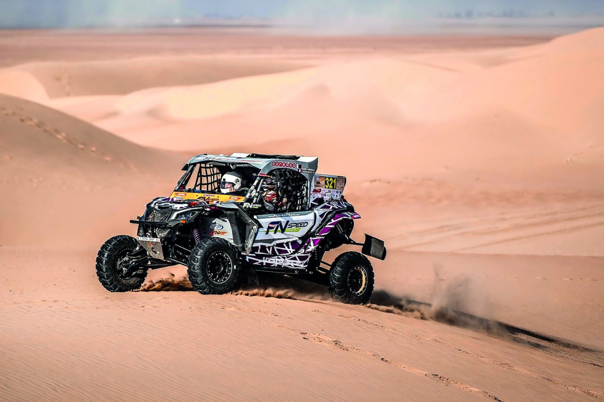 Qatari driver Adel Abdulla and French co-driver Jean-Michel Polato in action during the opening day of the Dubai International Baja yesterday.