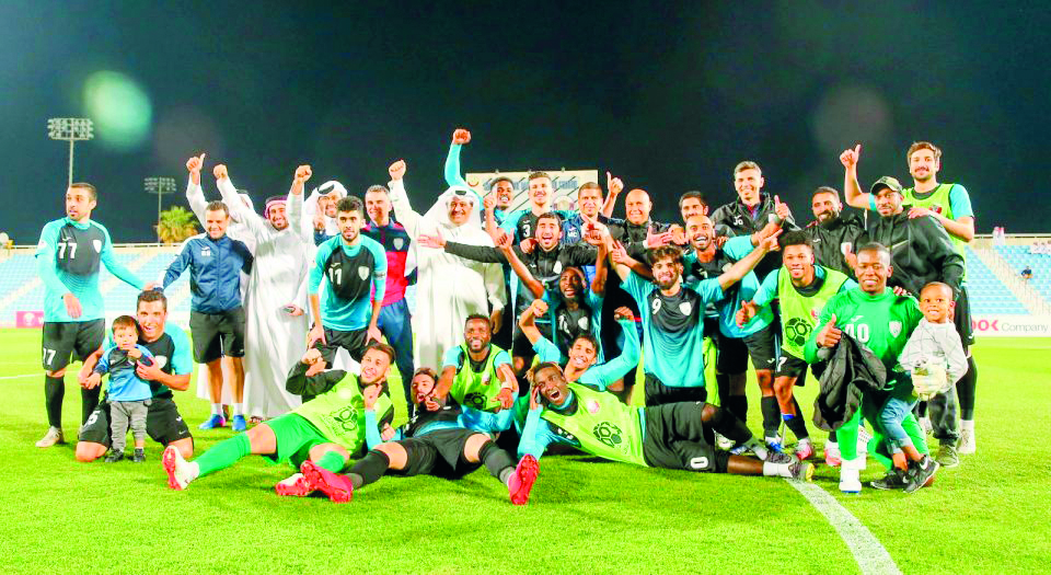 Al Wakra’s players and officials celebrate after securing their spot in the next season’s QNB Stars League.