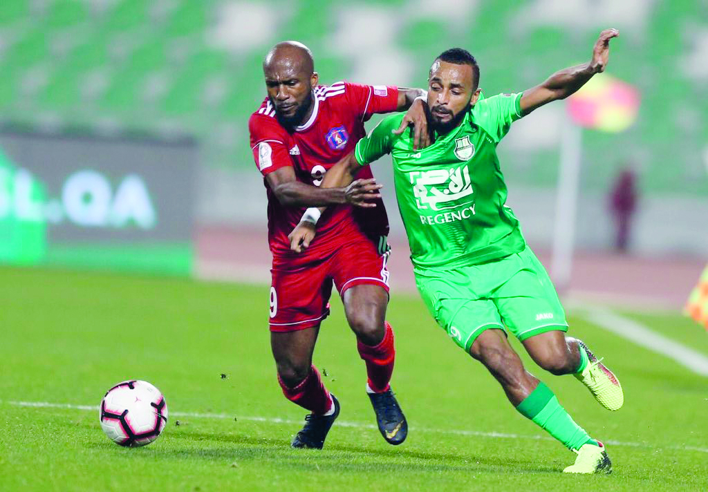 Players vie for the ball possession during the QNB Stars League Round 19 match between Al Ahli and  Al Shahania, yesterday. 