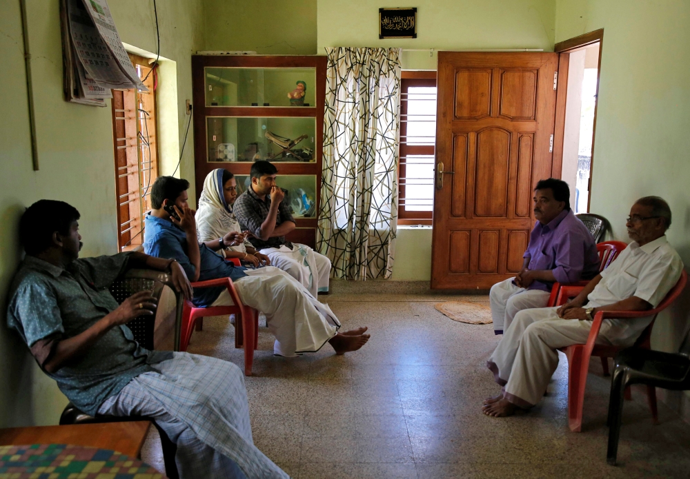 Relatives and neighbours of Anzi Ali Bhava, who was killed in Friday's mosque attacks in New Zealand, are seen during a condolence gathering at her parent's house in Kodungalloor town in the southern state of Kerala, India, March 17, 2019. Reuters/Sivaram