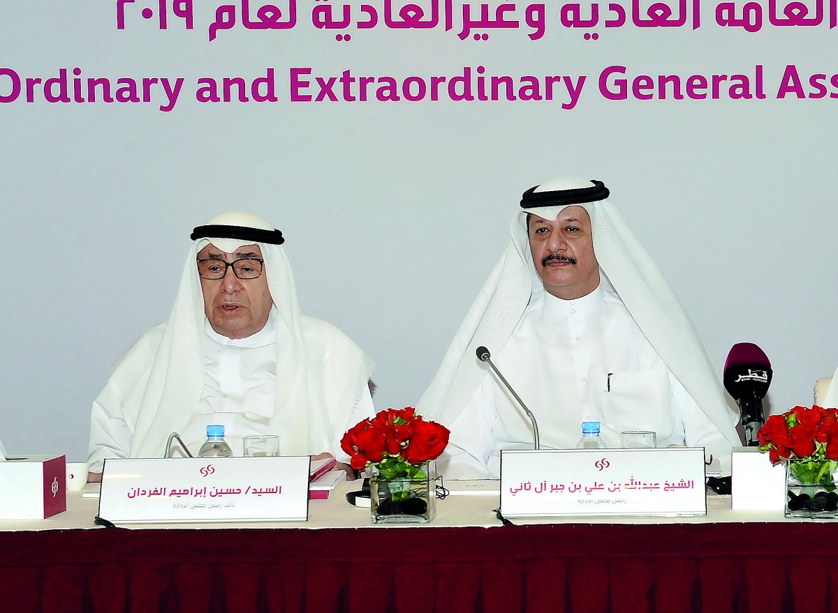 The Chairman of Commercial Bank of Qatar, Sheikh Abdulla bin Ali bin Jabor Al Thani (right); with the Vice-Chairman, Hussain Ibrahim Al Fardan; attending the AGM of the bank held at its headquarters in West Bay, Doha yesterday. Pic: Salim Matramkot/The Pe