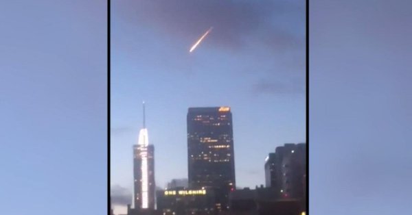 A bright orange fireball that arced over Hollywood -- home of countless disaster movies -- sent people scrambling to capture the scene for social media -- even if it later turned out to be more fiction than fact.