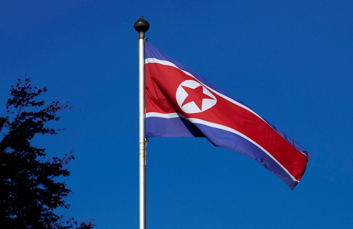 File photo of a North Korean flag flies on a mast at the Permanent Mission of North Korea in Geneva October 2, 2014. REUTERS/Denis Balibouse/File Photo