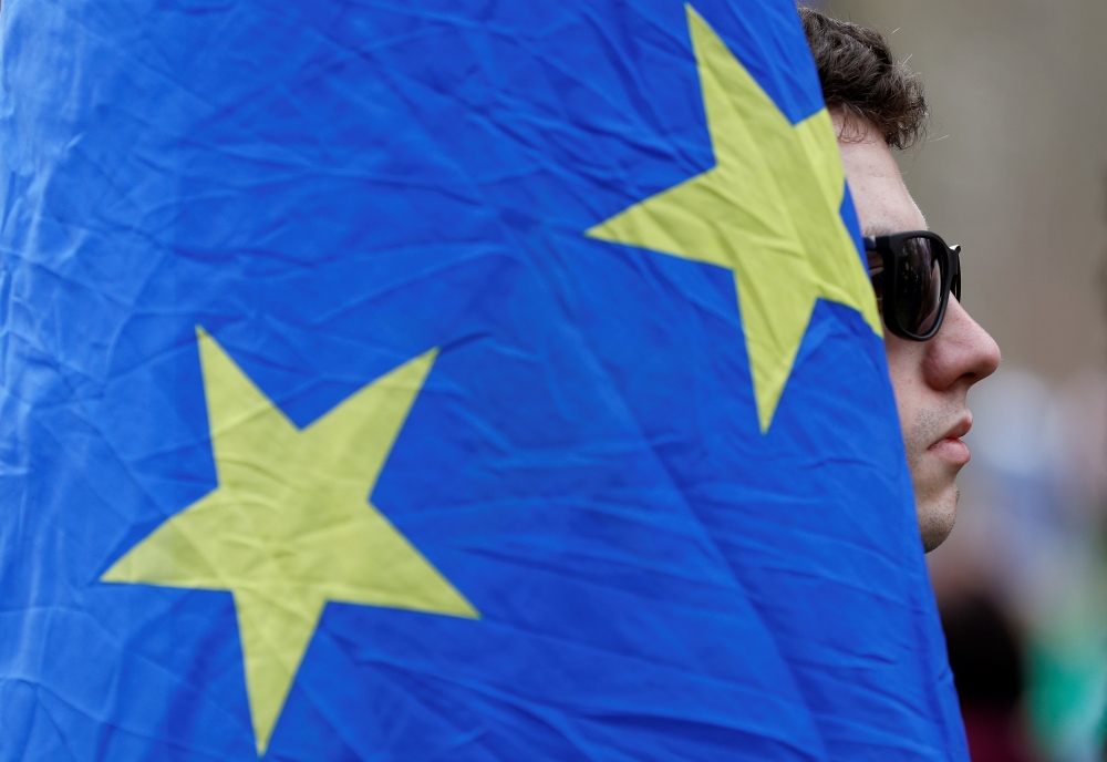 An EU supporter, calling on the government to give Britons a vote on the final Brexit deal, participates in the 'People's Vote' march in central London, Britain March 23, 2019. REUTERS/Peter Nicholls