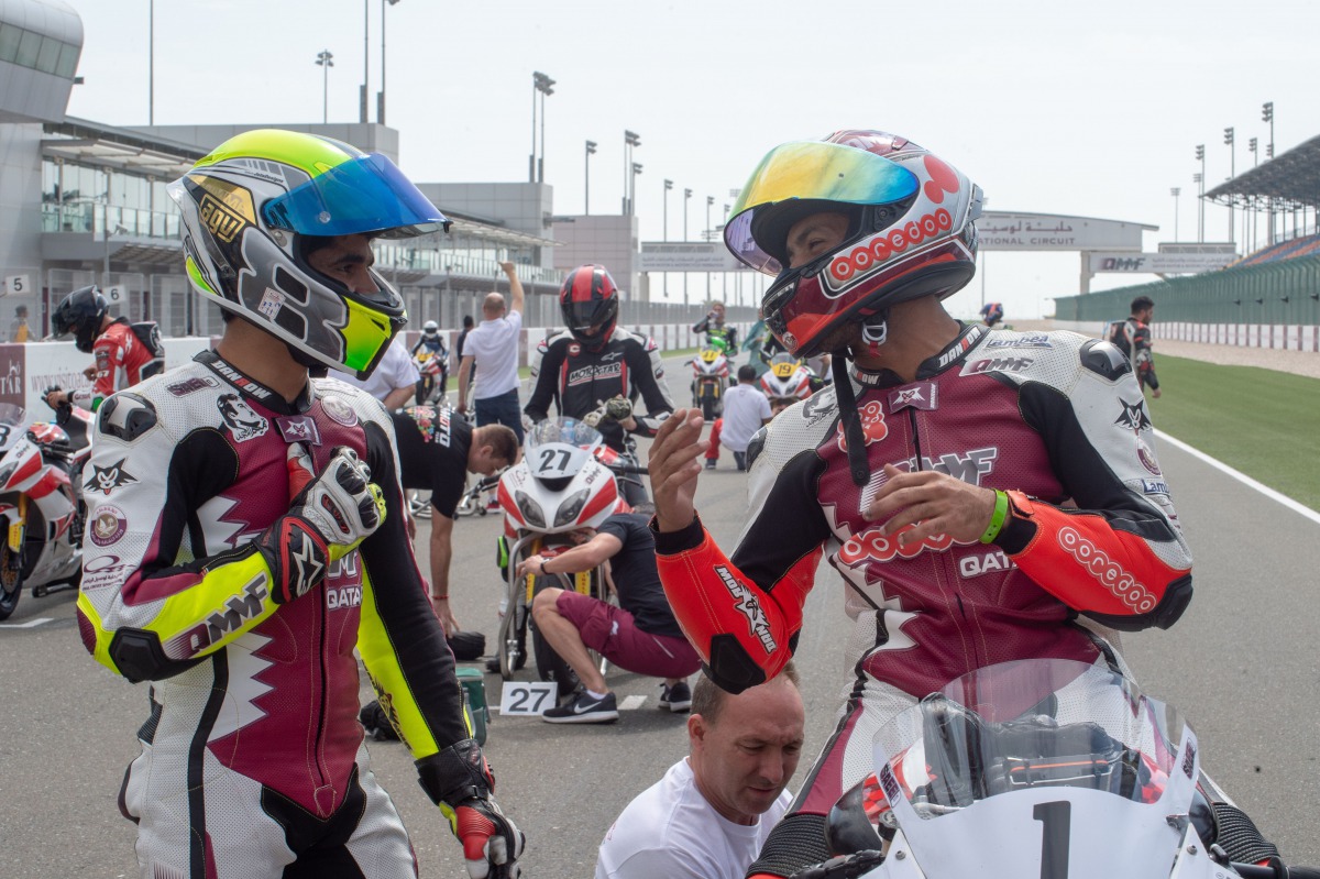 Saeed Al Sulaiti (right) and Abdulla Al Qubaisi before the start of a race at the Losail International Circuit in this file photo. 