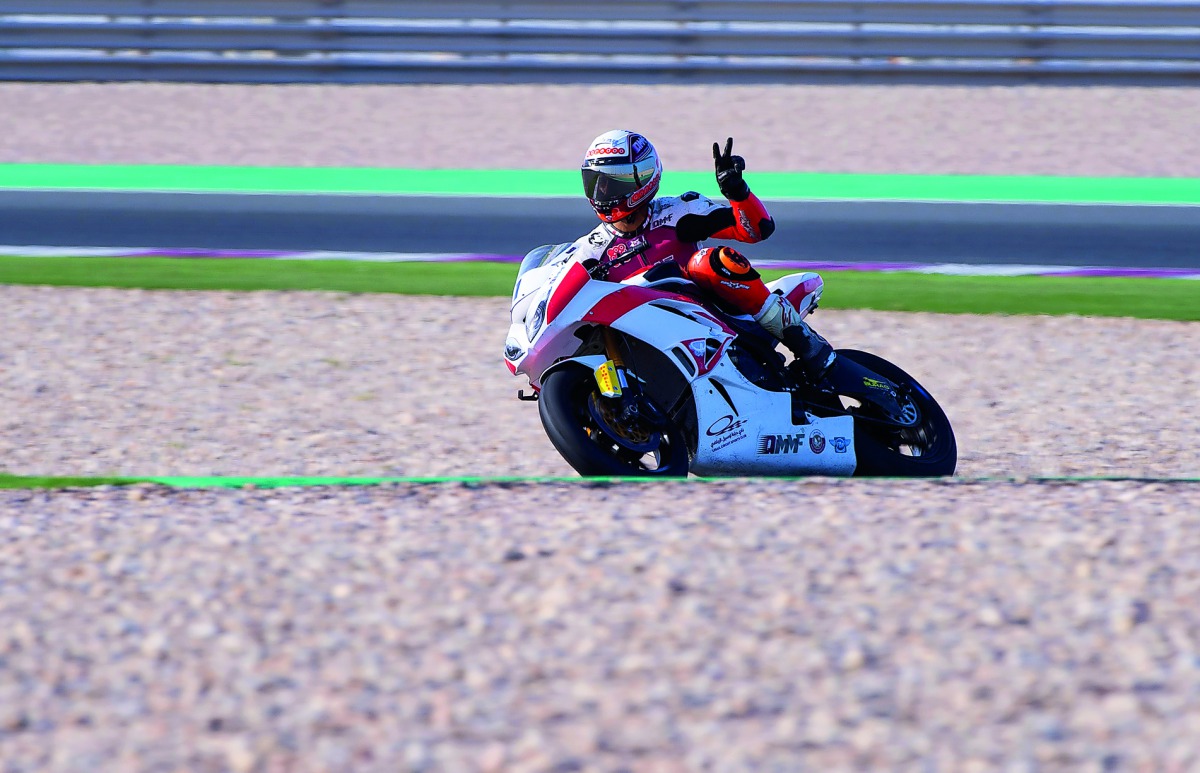 Saeed Al Sulaiti celebrates after wining the Superpole yesterday, ahead of the final round of the Superstock 600 Championship at Losail International Circuit which will take place today.